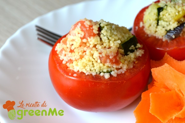 Tomatoes stuffed with couscous and zucchini