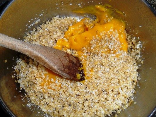 Vegan desserts: quinoa and mango pralines with chopped pistachios