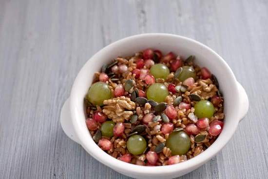 Autumn spelled salad with pomegranate grains and pumpkin seeds