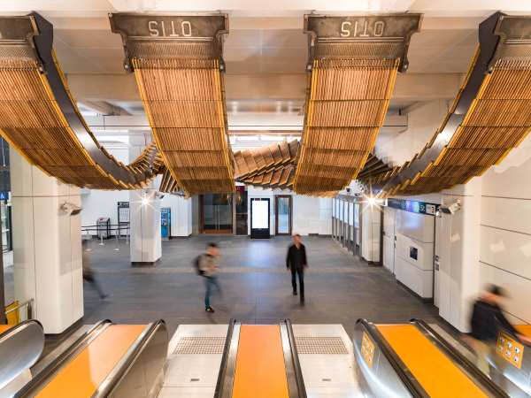 Transform historic escalators into a surreal and suspended installation