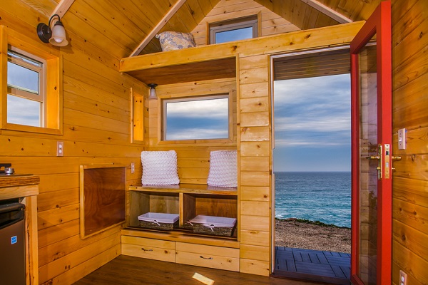 Half / Half: the portable, low-cost tiny house in recycled wood to put wherever you want