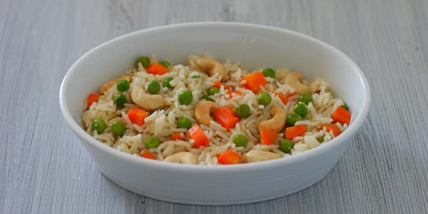 Spiced basmati rice with carrots, peas and cashews