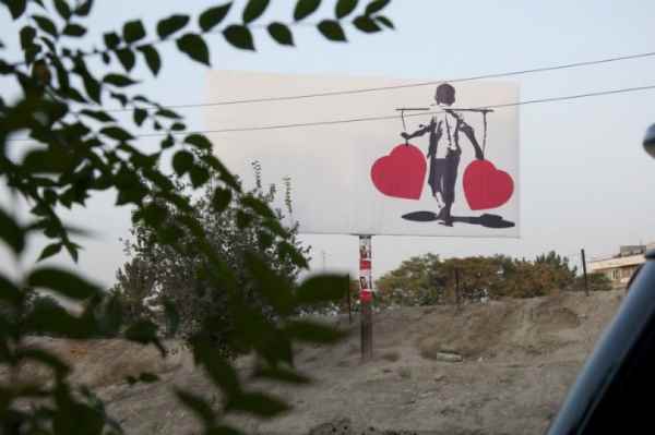 The Afghan Banksy who mends the wounds of war with street art (PHOTO)